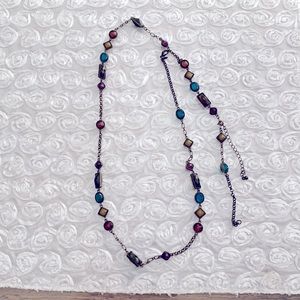 Costume piece with assorted jewel tones